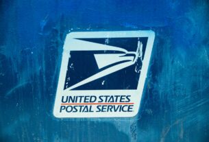 Postal Service Signage on Painted Wall