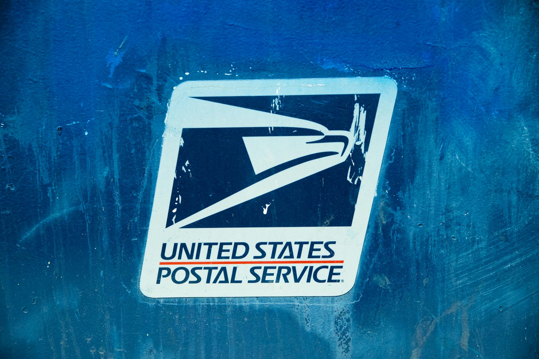 Postal Service Signage on Painted Wall